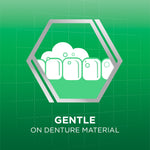 Green hexagon graphic showing foaming denture icons and text “Gentle on Denture Material”
