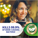 Smiling woman holding a cup overlaid with product claim 'Kills 99.9% of odor-causing bacteria' and a 'Mint Fresh' emblem