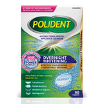 Polident overnight whitening cleanser box front showing logo, tablet illustration and claims about stain removal and antibacterial action.