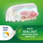 Illustrated denture showing adhesive sealing out food particles with Poligrip green panel reading helps seal out.