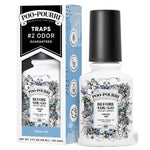 Poo-Pourri Fresh Air before-you-go toilet spray bottle beside its product box, floral label visible