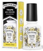 Poo-Pourri Original Citrus before-you-go toilet spray bottle with its retail box, lemon-accented label.