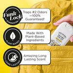 Hand placing a Poo‑Pourri Original Citrus pocket sprayer into a yellow bag with feature badges