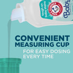 Graphic of Arm & Hammer Baby detergent being poured into a measuring cup with text about a convenient measuring cup for dosing.