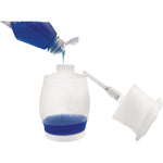 Liquid being poured into translucent Soap Daddy dispenser body shown with detached pump cap