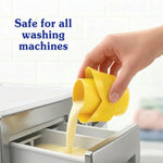 Hand pouring pale yellow liquid from a yellow measuring cap into a washing machine dispenser with text about machine safety