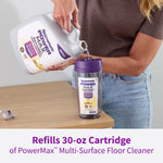 Person pouring Rejuvenate PowerMax refill liquid into a purple mop cartridge with text stating it refills a 30-oz cartridge