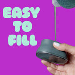 Close-up of liquid soap being poured into the Brite scrubber handle with purple background and “EASY TO FILL” text
