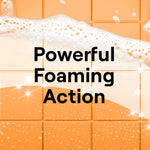 Orange tiled background with soap foam and bold text reading 'Powerful Foaming Action'