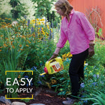 Person pouring a Preen Garden Weed Preventer bottle into a garden bed with overlay text 'EASY TO APPLY'