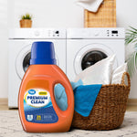Great Value Premium Clean detergent bottle staged in a laundry room scene next to a wicker basket and washing machines