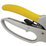 Close crop of yellow cushioned handle and silver lower frame of ratcheting pruning shears showing the locking tab