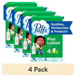 Four green Puffs Plus Lotion family-style tissue boxes shown in a staggered 4-pack arrangement