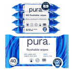 Stack of four blue Pura flushable wipes packs showing a 160 flushable wipes label and brand name