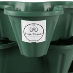 Close-up of a hunter green planter cup showing a Pure Garden brand label on the front surface