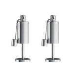 Two stainless-steel table torch lamps with chained snuffers on white background