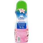 Back view of a Purex Crystals Fresh Cherry Blossom bottle showing product directions, warnings, and floral design
