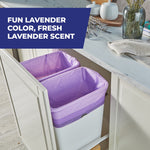 Two purple trash bags installed in a pull-out kitchen cabinet bin with overlay text about fun lavender color and scent