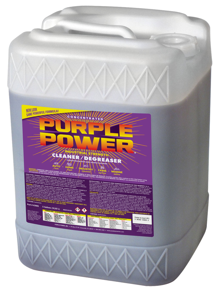 Large plastic jug with a purple label reading “Purple Power” industrial strength cleaner/degreaser on front