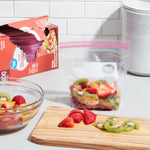 Kitchen scene with a clear resealable quart bag of mixed fruit on counter and a product box in background
