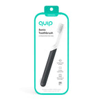 Retail blister card for Quip sonic toothbrush showing charcoal handle and white brush head with teal border