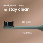 Side profile of a quip toothbrush head showing brush pod seated on handle with text about staying clean