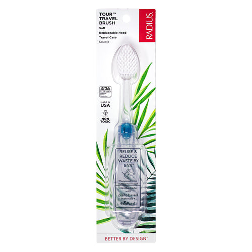 Radius Tour travel toothbrush in clear plastic hide-away handle with visible bristles and green leaf packaging art