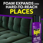 Raid Bed Bug foaming spray can beside a green upholstered sofa with graphic text about foam reaching hard-to-reach places