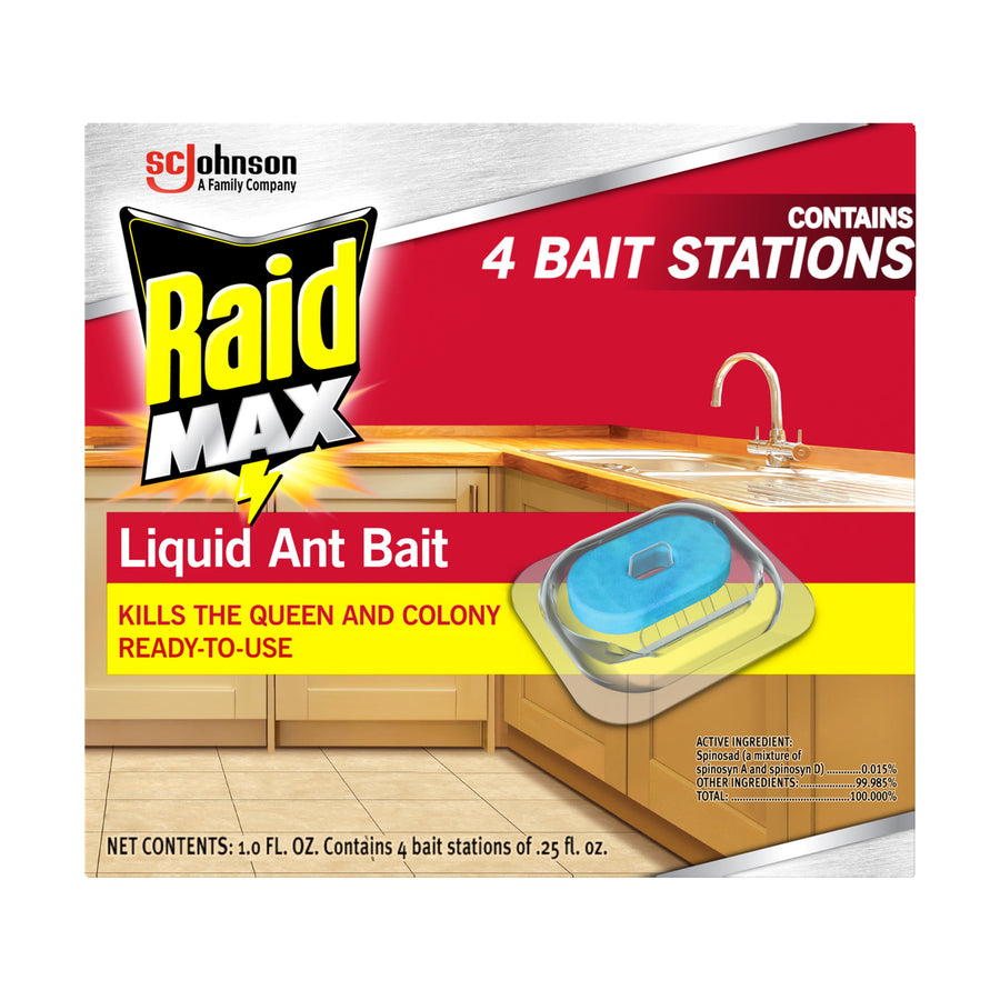 Front-facing product box showing Raid MAX Liquid Ant Bait branding and an illustration of a plastic bait station on a kitchen counter.