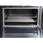Open oven showing a Range Kleen liner placed on the lower rack inside the oven cavity.