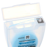 Open translucent REACH Ultraclean floss dispenser showing floss thread and internal cutter compartment