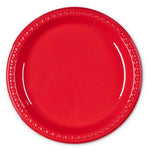 Single red plastic plate photographed flat on white background showing glossy finish and decorative rim