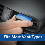 Close-up of a blue Refresh contour vent stick clipped into a car air vent being adjusted by a finger