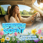 Person driving with eyes closed and floral foreground graphics plus text promoting 'Refreshing Scent' spring rain fragrance