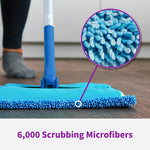 Low-angle view of a mop with Rejuvenate pad and inset magnified close-up of dense blue microfiber scrubbing fibers.
