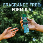 Hand passing a Repel Family spray can between people against a leafy background with 'fragrance-free formula' text