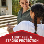 Smiling adult and child outdoors with a red caption reading light feel & strong protection promoting the Repel Tick Defense product