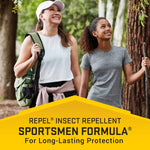 Two people hiking in a wooded area with a yellow banner below stating Repel Insect Repellent Sportsmen Formula for protection.