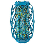 Close-up of a blue Rescue! Fly Trapstik unit with diamond-pattern cage and many trapped flies on the adhesive core
