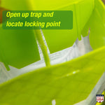 Close-up of the trap top showing lime green plastic panels and text overlay reading ‘Open up trap and locate locking point’