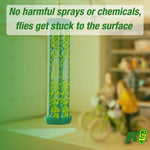 Hanging RESCUE! TrapStik in a garage-like scene with green overlay text claiming no harmful sprays or chemicals