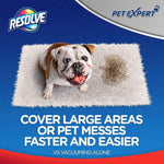 Top-down view of a bulldog sitting on a carpet with a dirty spot and Resolve branding promoting coverage of large areas