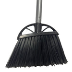 Close-up of a Reynera black angle-cut broom head and gray handle showing dense poly bristles and plastic support.
