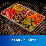 Aluminum disposable grilling pan on a grill filled with grilled vegetables, caption 'Fits All Grill Sizes' at bottom