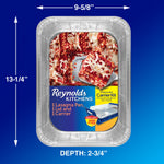 Product-dimension graphic showing a Reynolds Kitchens aluminum lasagna pan with label and arrows for width and length measurements