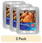 Three Reynolds Kitchens heavy-duty disposable aluminum roasting pans shown with product label