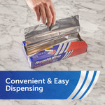 Hand pulling a pre-cut sheet from an open Reynolds Wrap foil dispenser box on a marble surface.