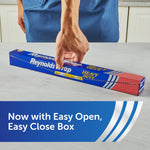 Person opening a Reynolds Wrap Heavy Duty foil box on a kitchen counter, easy open box callout