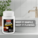 Roebic Foaming Root Killer bottle placed on a bathroom vanity with text reading keep it simple, keep it flowing.