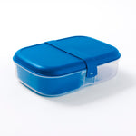 Blue-lidded Rubbermaid bento box with clear bottom and central latch on white background